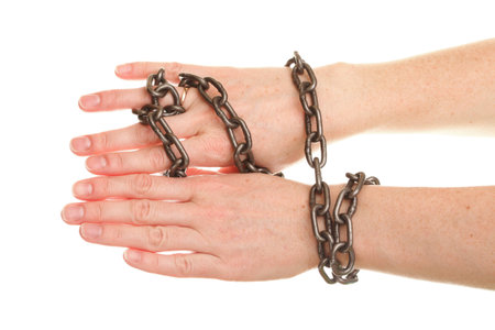 isolated chain on woman hand and wedding Ring 