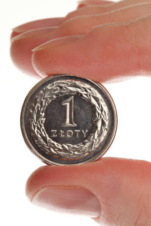 Polish money isolated on white in handの写真素材