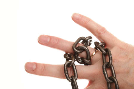 isolated chain on woman hand and wedding Ring の写真素材