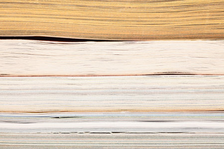 stack of opened magazines background texture