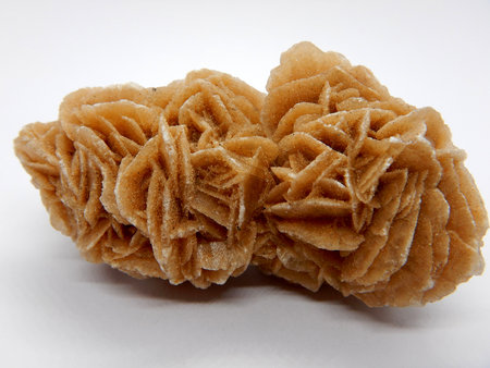 Desert rose crystal close-up against a white backgroundの写真素材