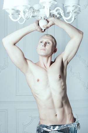 Male albino with white skin in a white room.の写真素材