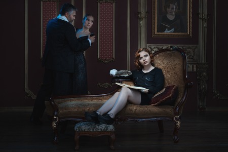 Woman writer writes a novel about a young girl and an old man.の写真素材