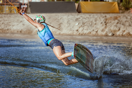 Wakeboard ride on the water at the lake in the park.の写真素材