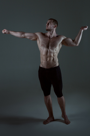 Man with a beautiful athletic body, a beautiful muscle relief.の写真素材