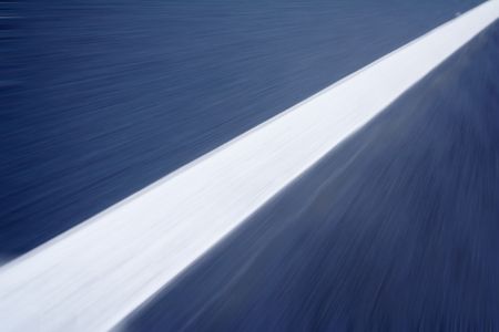 white line on the road with motion blurの写真素材
