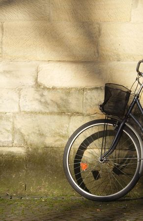 a bike by the wallの写真素材