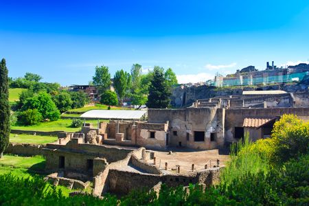 Historic ruined buildings with trees in Pompeiの写真素材