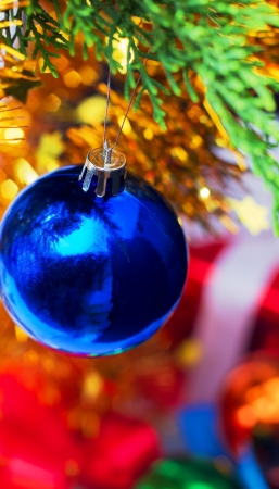 hanging blue christmas ball close upの写真素材