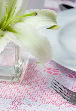bloom white lily decorate on dining tableの写真素材
