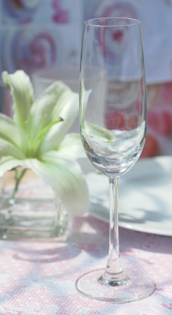 wineglass already set on dining tableの写真素材