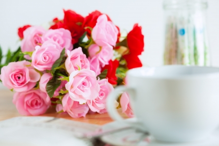 artficial roses on deskの写真素材