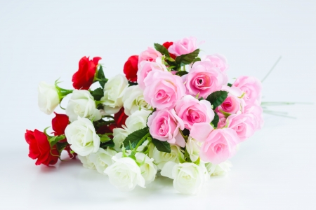 artificial roses bouquet on white backgroundの写真素材