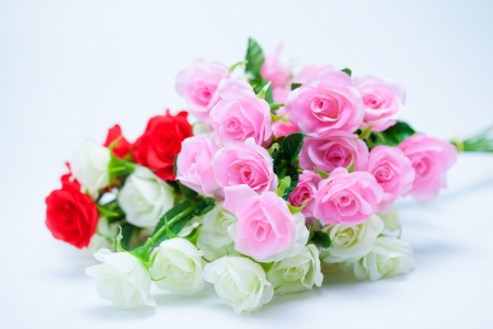 artificial roses bouquet on white backgroundの写真素材