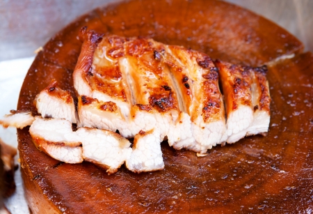 grilled pork on chopping blockの写真素材
