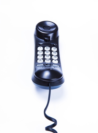 black telephone on white backgroundの写真素材