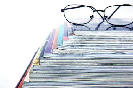 magazine stack on white backgroundの写真素材