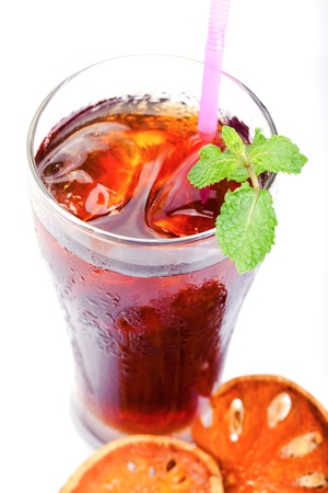 a glass of iced bael fruit on white backgroundの写真素材