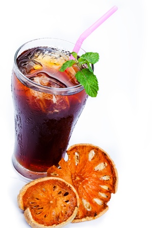 a glass of iced bael fruit on white backgroundの写真素材