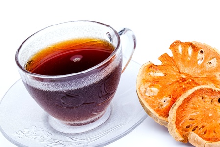 a cup of hot bael fruit on white backgroundの写真素材