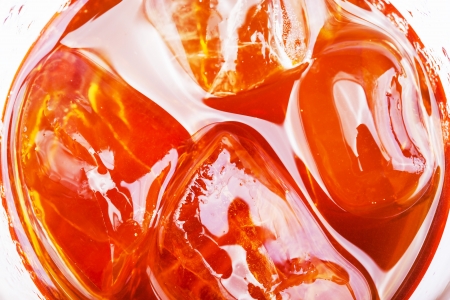 soft drink with ice in glass close upの写真素材