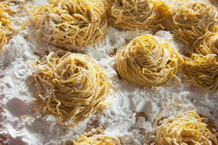 homemade chinese noodles pileの写真素材