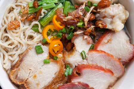 noodle with crispy pork and sliced fried pork,thai foodの写真素材