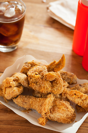 fried chicken serve in paper box for mealの写真素材