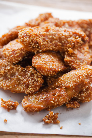 deep fried bananas with sesame on paper,thai fodの写真素材