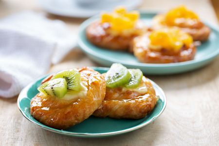 kiwi fruit danish pastry in plateの写真素材