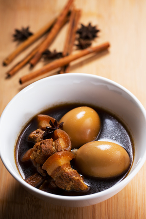 hard-boiled eggs and pork belly in sweet gravyの写真素材