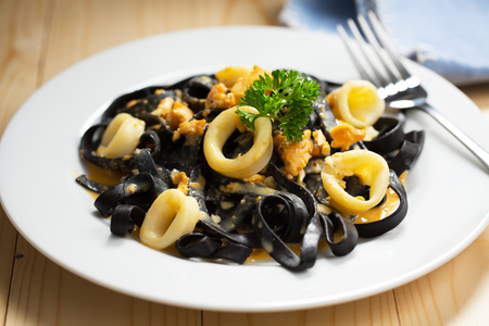 ink squid pasta with cuttlefish for mealの写真素材