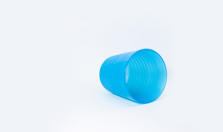 Blue glasses for children, Blue cup on the white backgroundの写真素材