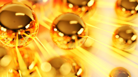 Macro view of glowing golden glass spheres with radial light beams in abstract molecular composition