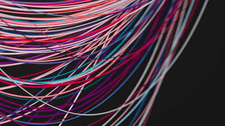 Colorful data cables intertwining in motion against dark background