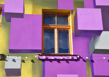 Public street window on the wall with colorful 3d graffitiの写真素材