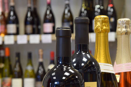 Wine bottles in the shop, cafe, restaurant. Wines for all tastes and celebrations.の写真素材