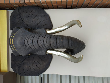 elephant statue on wallの写真素材