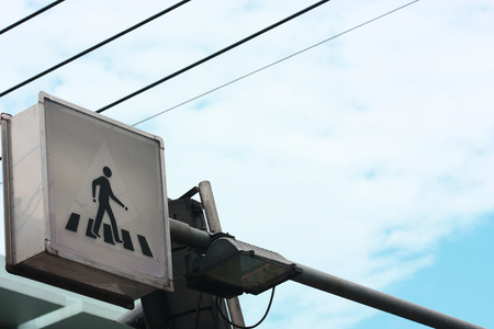 walk sign on poleの写真素材