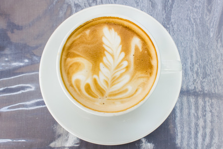Cappuccino with latte art (coffee)の写真素材