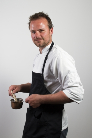 chef holding copper panの写真素材