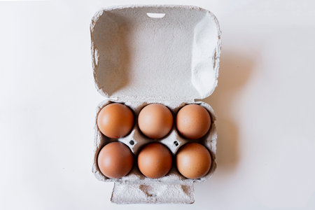 six eggs pack isolated on white background