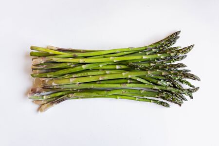 green asparagus isolated on white backgroundの写真素材