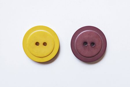 clothing buttons isolated on white backgroundの写真素材