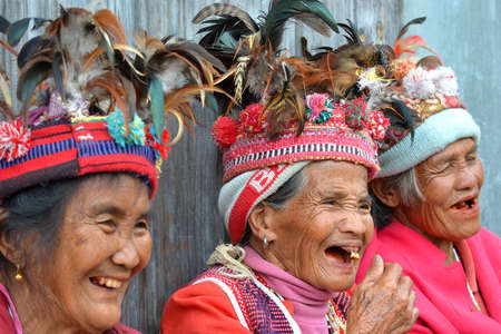 Face of unknown old smiling ifugao women in national costume near rice terraces. Ifugao - mountain people.のeditorial素材