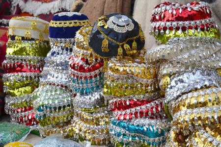Colorful decorative headgear on exposed at the Erbil Bazaar in Kurdish Iraq.の写真素材