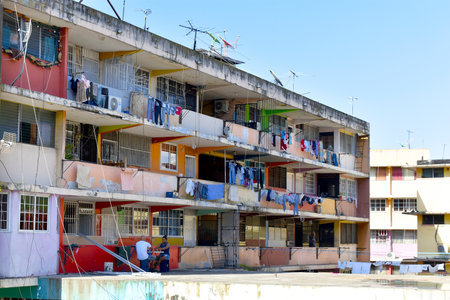 Panama City, Panama - February 9, 2021: Prefabricated houses on the edge of the old center of Panama City, ordinary life, clothes on a clothesline.のeditorial素材