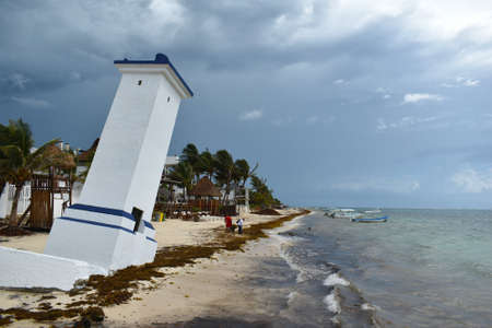 Puerto Morelos, Mexico - September 10, 2021: Tilted Faro Inclinado lighthouse in Puerto Morelos at the Malecon wooden pier on the Yucatan Peninsula in Mexico.のeditorial素材