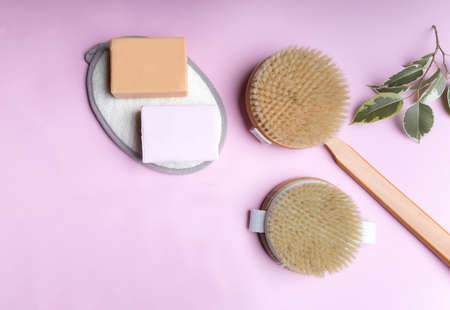 body care products, brushes, soap non-waste, flat lay on a pink background.の写真素材