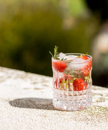 Summer fresh cocktail with summer fresh cocktail with strawberry and rosemary and rosemary, cool drinkの写真素材